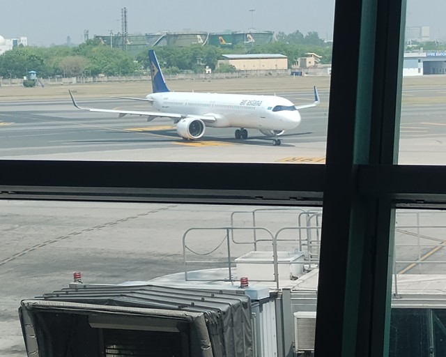 77057
