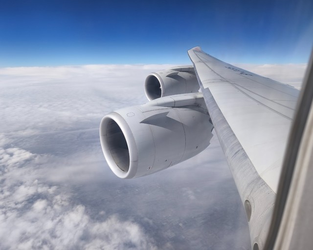 77703