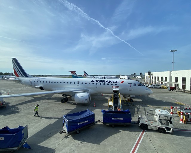 77719
